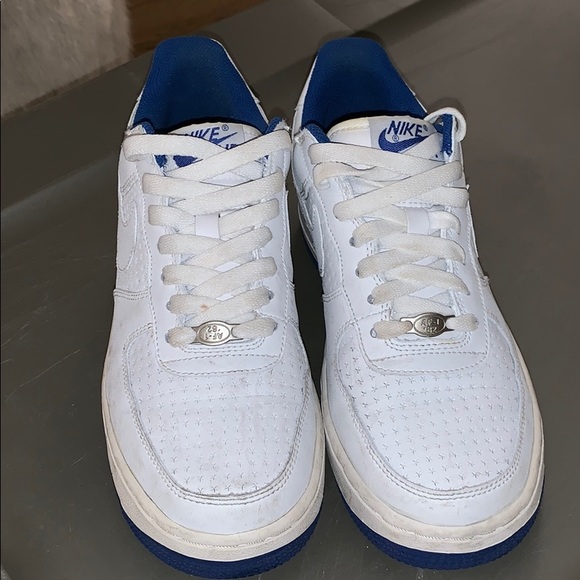 white and royal blue nikes